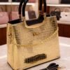 womens crocodile pattern handbag with gold chain and metallic handles